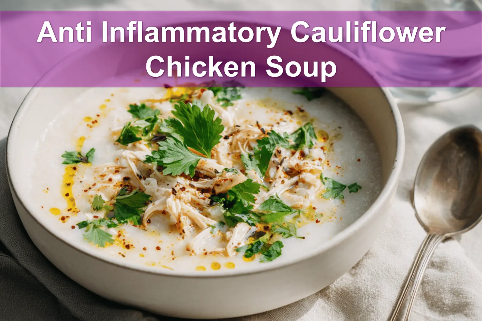 Anti Inflammatory Cauliflower Chicken Soup warm bowl garnished with fresh herbs and creamy coconut drizzle