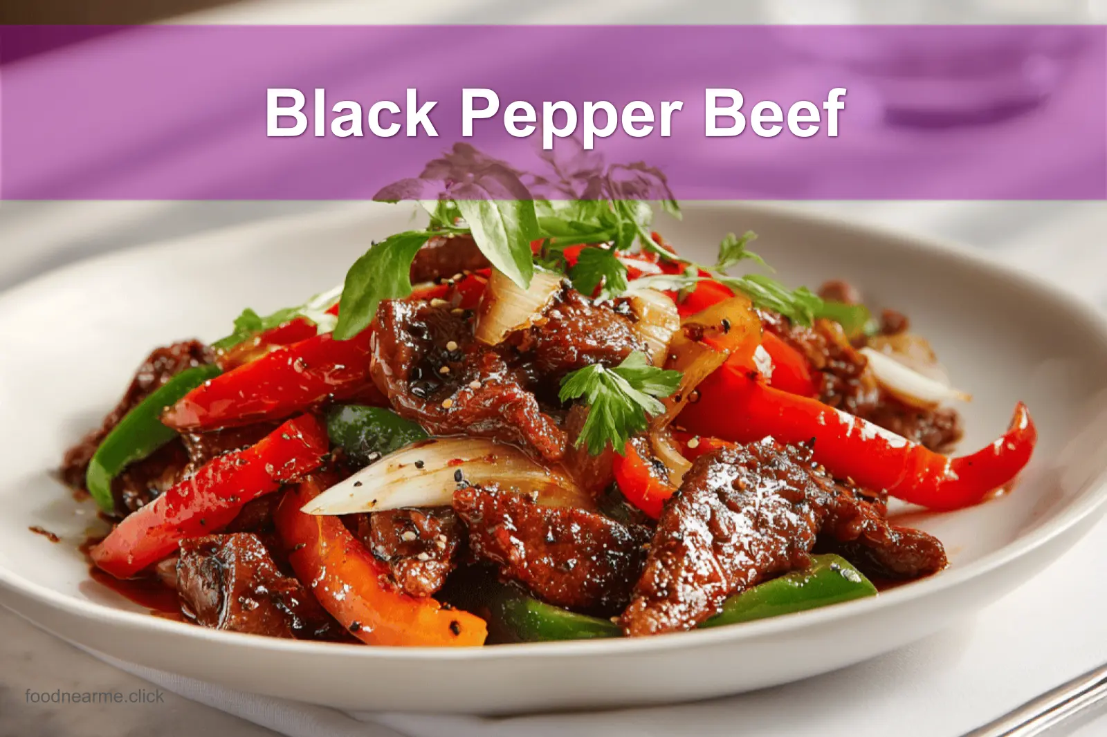 Black Pepper Beef dish with colorful peppers and glass of water