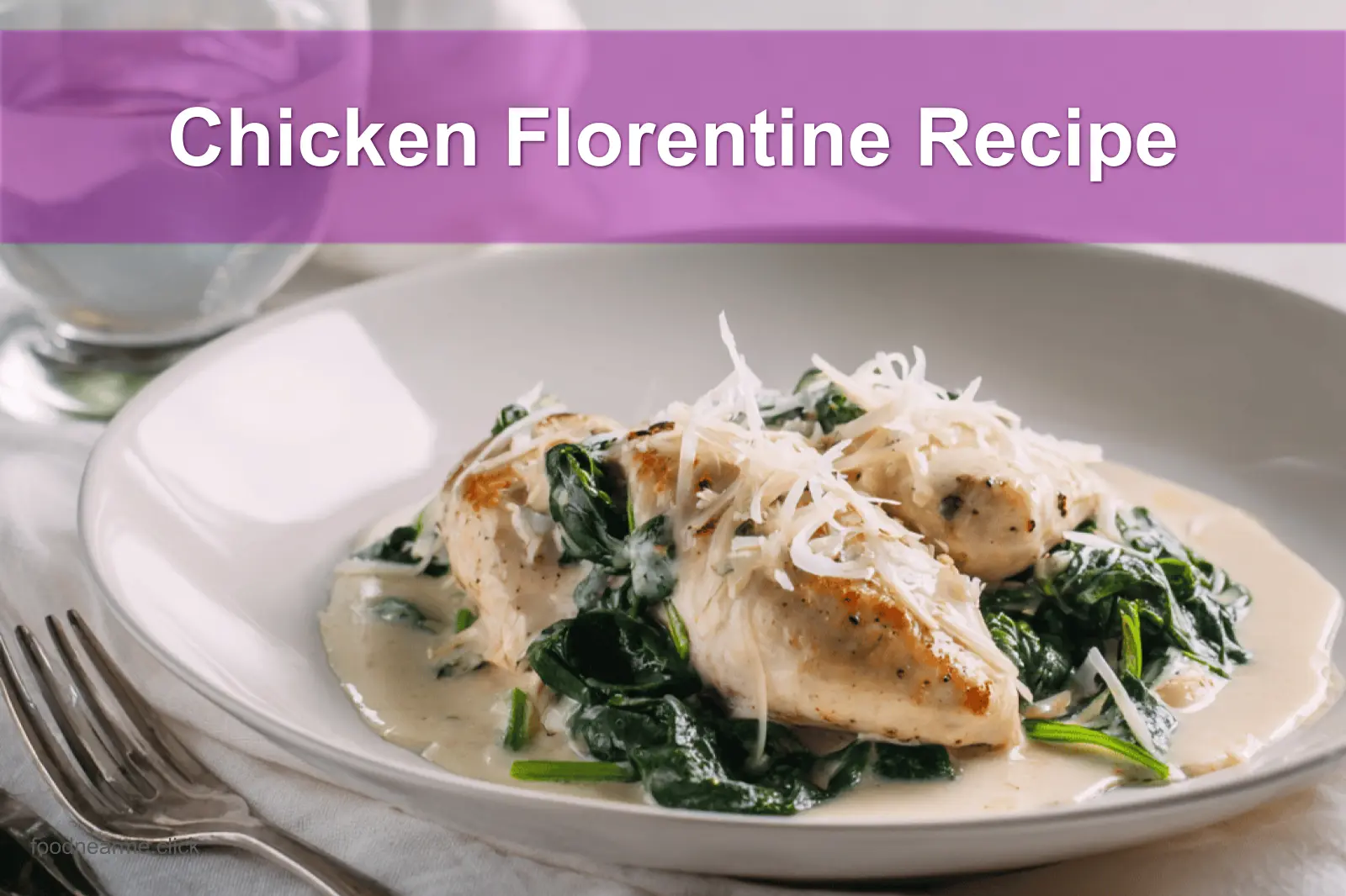 Chicken Florentine Recipe finished dish on white cloth with clear glass of water warm natural light
