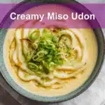 Bowl of Creamy Miso Udon with green onions in warm natural light