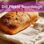 Dill Pickle Sourdough Loaf on a white napkin with natural light