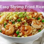 Easy Shrimp Fried Rice plated on white napkin with glass of water warm natural light