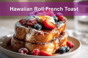 Hawaiian Roll French Toast plated with berries powdered sugar maple syrup on white cloth napkin