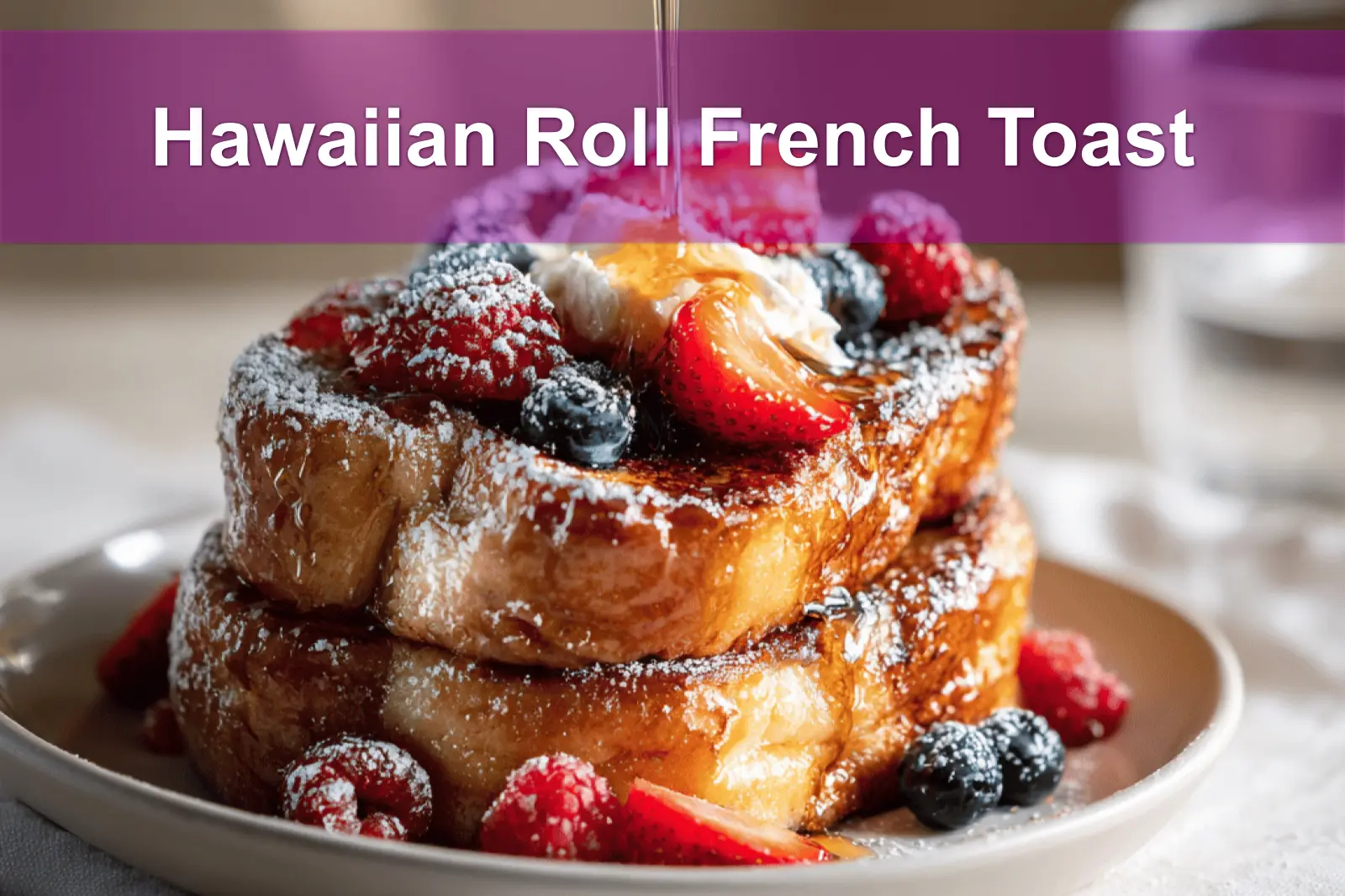Hawaiian Roll French Toast plated with berries powdered sugar maple syrup on white cloth napkin
