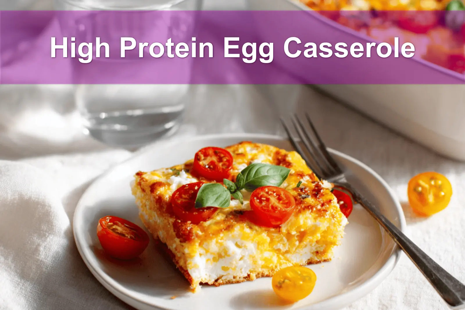 High Protein Egg Casserole golden baked with cherry tomatoes and basil in warm natural light
