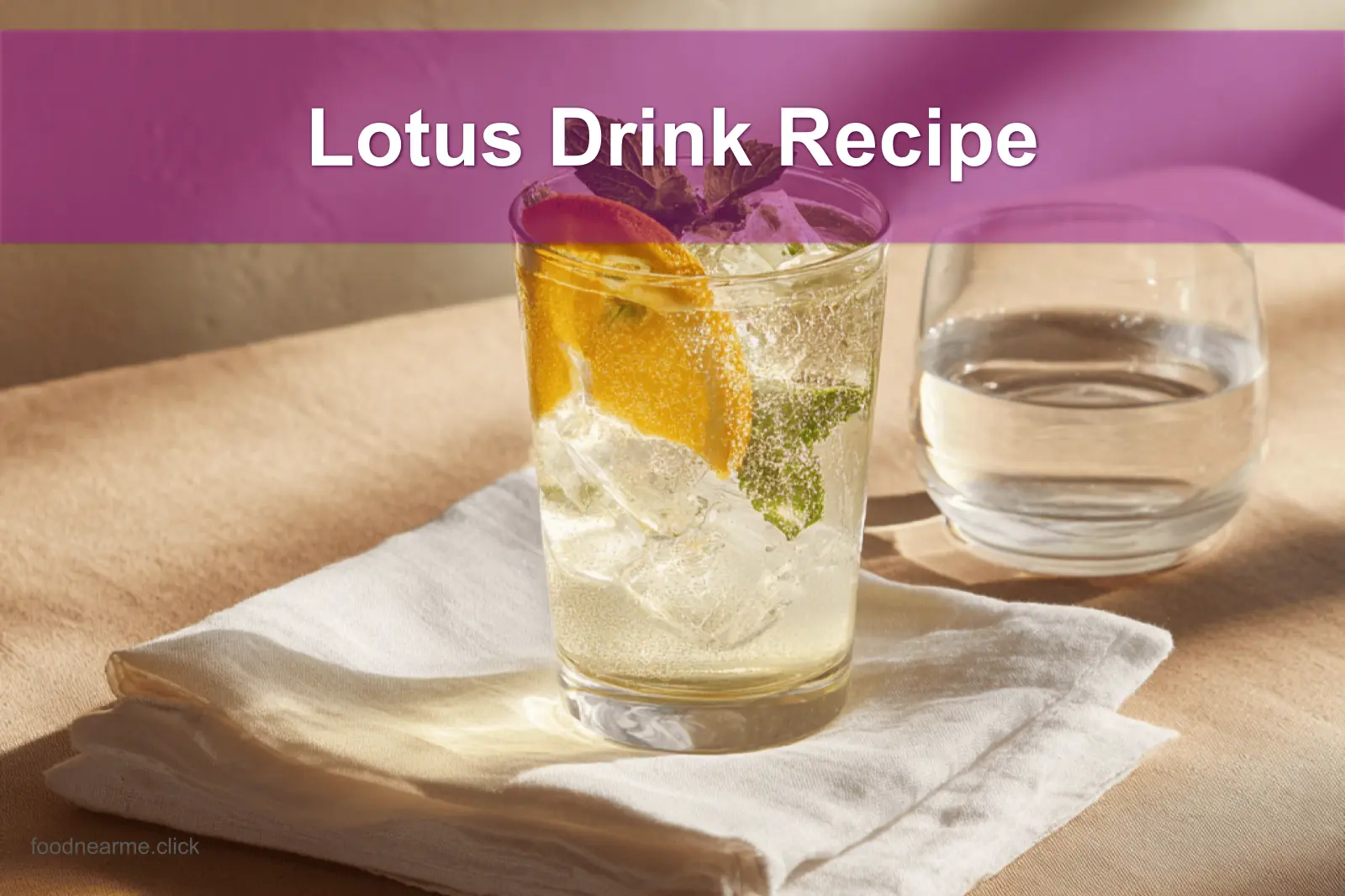 Lotus Drink Recipe in a clear glass with vibrant colors and fresh garnish