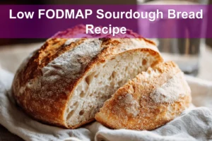 Low FODMAP Sourdough Bread Recipe finished loaf on white napkin and glass of water