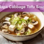 Napa Cabbage Tofu Soup bowl with tender tofu napa cabbage mushrooms and warm savory broth