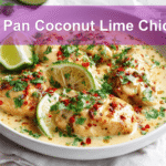 One Pan Coconut Lime Chicken plated with fresh garnishes and a creamy sauce
