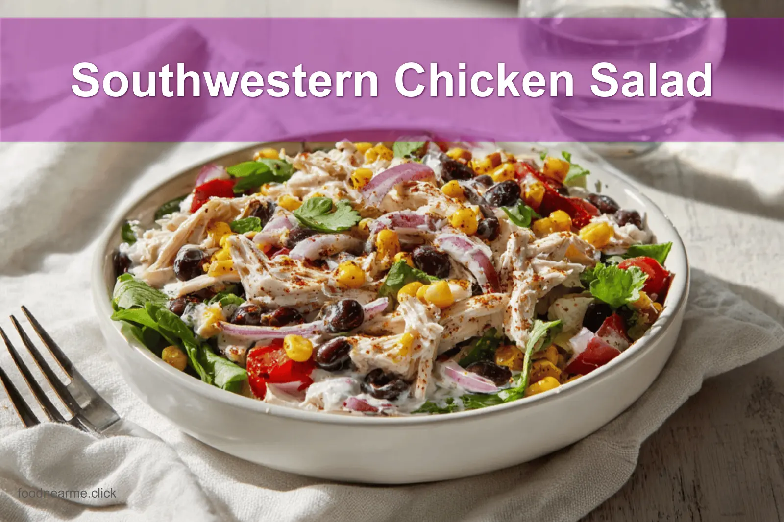 Southwestern Chicken Salad with vibrant ingredients and creamy Greek yogurt dressing displayed with warm tones.