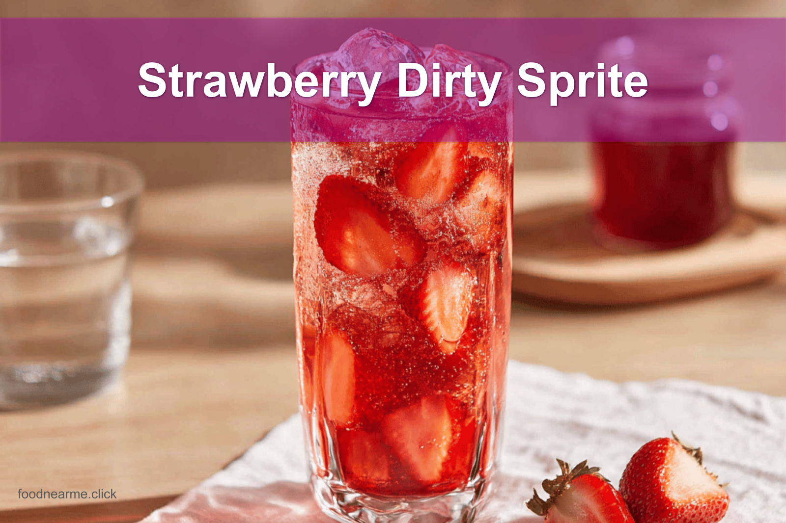 Strawberry Dirty Sprite in a clear glass with ice, fresh strawberries, and a vibrant summer vibe