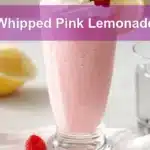 Whipped Pink Lemonade served with cream and raspberries to beat the heat