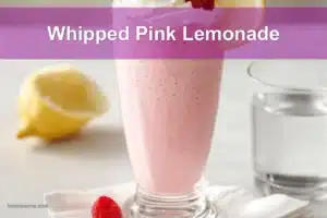 Whipped Pink Lemonade served with cream and raspberries to beat the heat