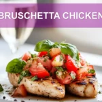 BRUSCHETTA CHICKEN topped with tomatoes basil garlic and balsamic glaze in warm light