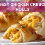 CHEESY CHICKEN CRESCENT ROLLS golden baked crescents with melted cheese and herb garnish