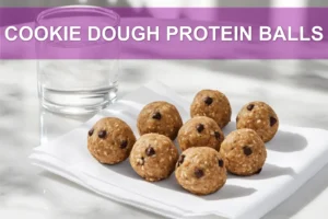 COOKIE DOUGH PROTEIN BALLS single bowl on white cloth warm natural light shallow depth of field