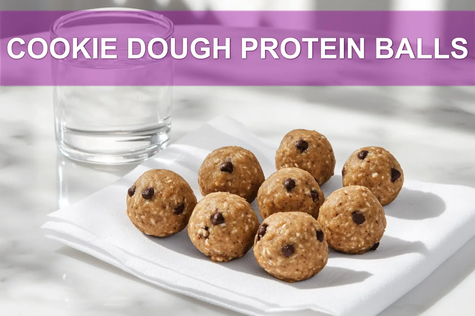 COOKIE DOUGH PROTEIN BALLS single bowl on white cloth warm natural light shallow depth of field