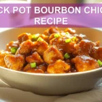 CROCK POT BOURBON CHICKEN RECIPE glazed chicken in bowl on white napkin with clear water