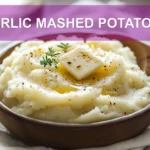 GARLIC MASHED POTATOES warm buttery yukon and russet mash roasted garlic olive oil sea salt