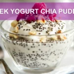 GREEK YOGURT CHIA PUDDING with mixed berries nuts and dark chocolate chips in a glass