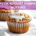 GREEK YOGURT PUMPKIN MUFFINS warm homemade muffins on white napkin with glass of water