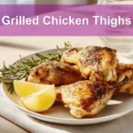 Grilled Chicken Thighs on white napkin with clear water glass warm natural light