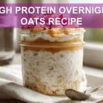 HIGH PROTEIN OVERNIGHT OATS RECIPE creamy jar with berries and coconut warm natural light