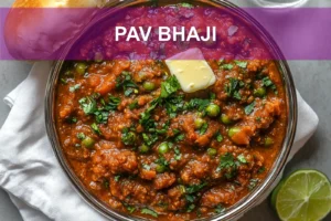 Pav Bhaji: Easy Delicious Indian Street Feast PAV BHAJI hero bowl with buttered pav herbs lime wedge and glass of water
