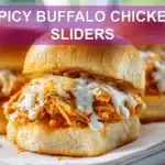 SPICY BUFFALO CHICKEN SLIDERS on slider buns with buffalo sauce melted cheese garlic butter
