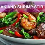 STEAK AND SHRIMP STIR FRY hero photo on white napkin warm natural light restaurant style