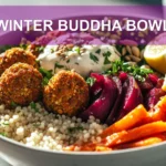 WINTER BUDDHA BOWL with golden falafel pearl couscous beet kale and creamy tahini sauce