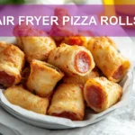AIR FRYER PIZZA ROLLS close up on white napkin with glass of water and herbs