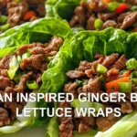 ASIAN INSPIRED GINGER BEEF LETTUCE WRAPS centered hero view, clean and uncluttered