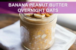Banana Peanut Butter Overnight Oats: Easy Delicious Recipe BANANA PEANUT BUTTER OVERNIGHT OATS jar with banana and peanut butter warm natural light