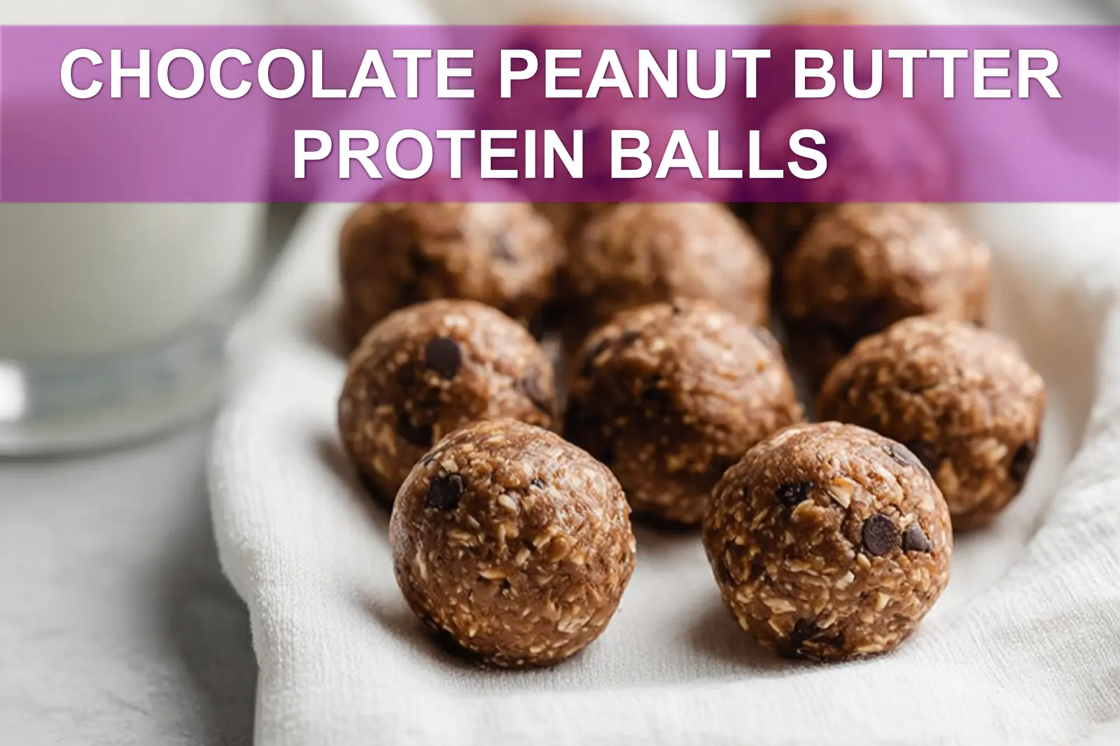 CHOCOLATE PEANUT BUTTER PROTEIN BALLS on white napkin with glass of water warm natural light