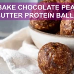 NO BAKE CHOCOLATE PEANUT BUTTER PROTEIN BALLS close up warm natural light shallow focus image