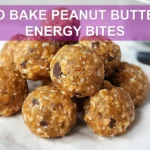 NO BAKE PEANUT BUTTER ENERGY BITES on white napkin with clear glass of water warm light