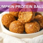 PUMPKIN PROTEIN BALLS on white napkin with warm natural light and soft shallow focus