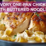 SAVORY ONE-PAN CHICKEN WITH BUTTERED NOODLES plated with egg noodles herbs butter warm glow