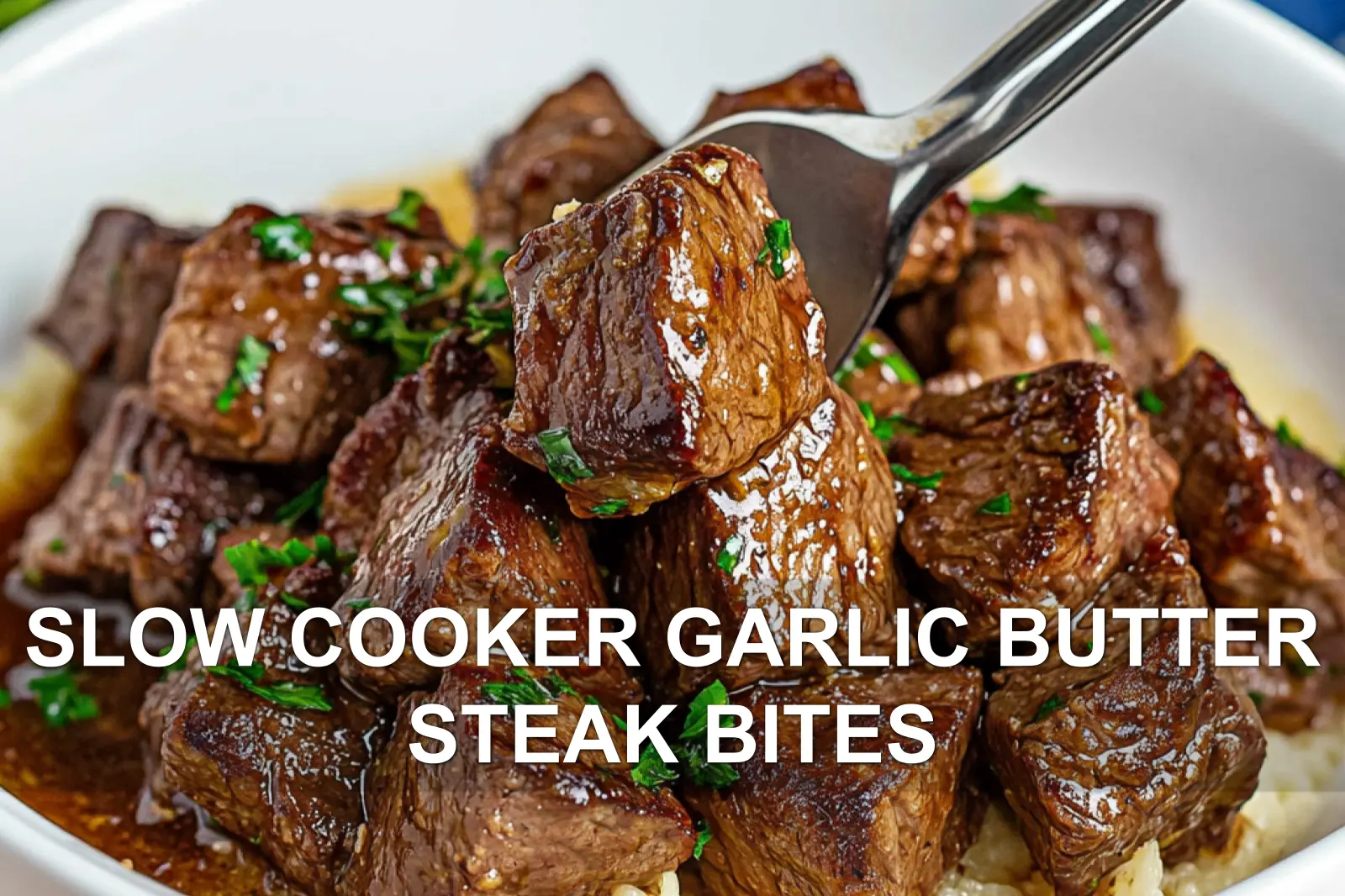 SLOW COOKER GARLIC BUTTER STEAK BITES centered hero view, clean and uncluttered