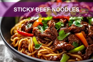Sticky Beef Noodles: Quick & Delicious Recipe STICKY BEEF NOODLES close-up plated with sesame and green onions, warm natural light