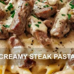 CREAMY STEAK PASTA centered hero view, clean and uncluttered