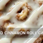 ICED CINNAMON ROLL CAKE centered hero view, clean and uncluttered