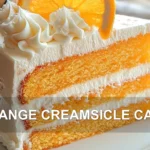 ORANGE CREAMSICLE CAKE centered hero view, clean and uncluttered