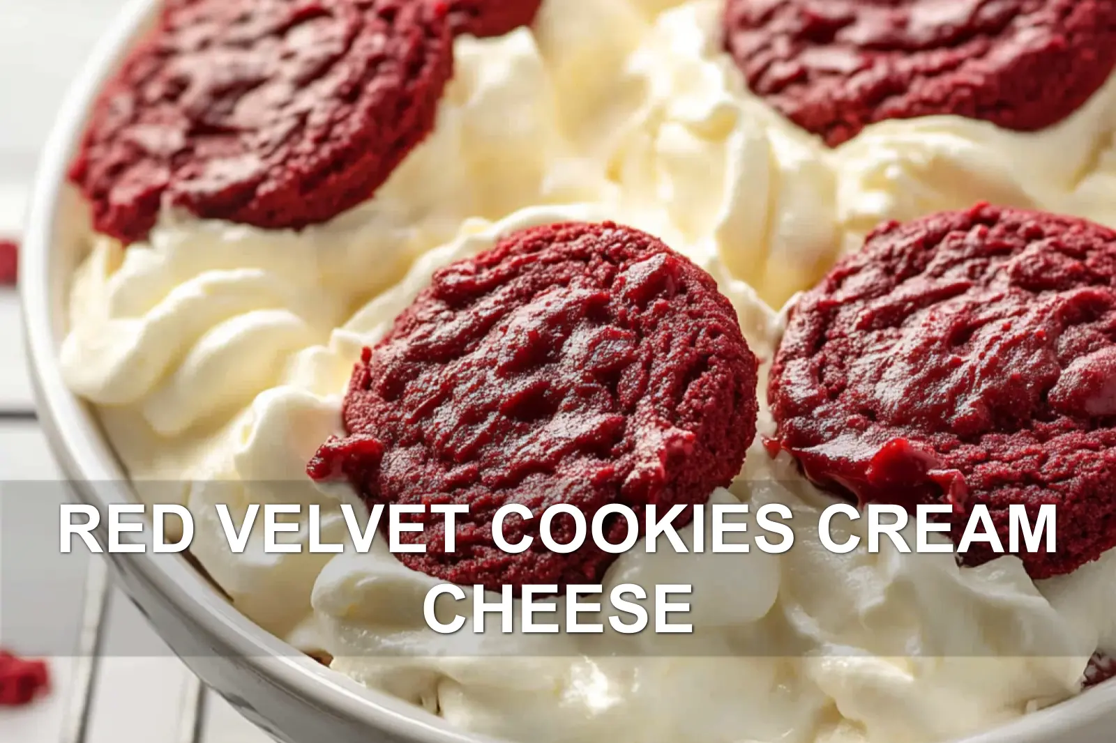 Red velvet cookies with a dollop of cream cheese frosting.