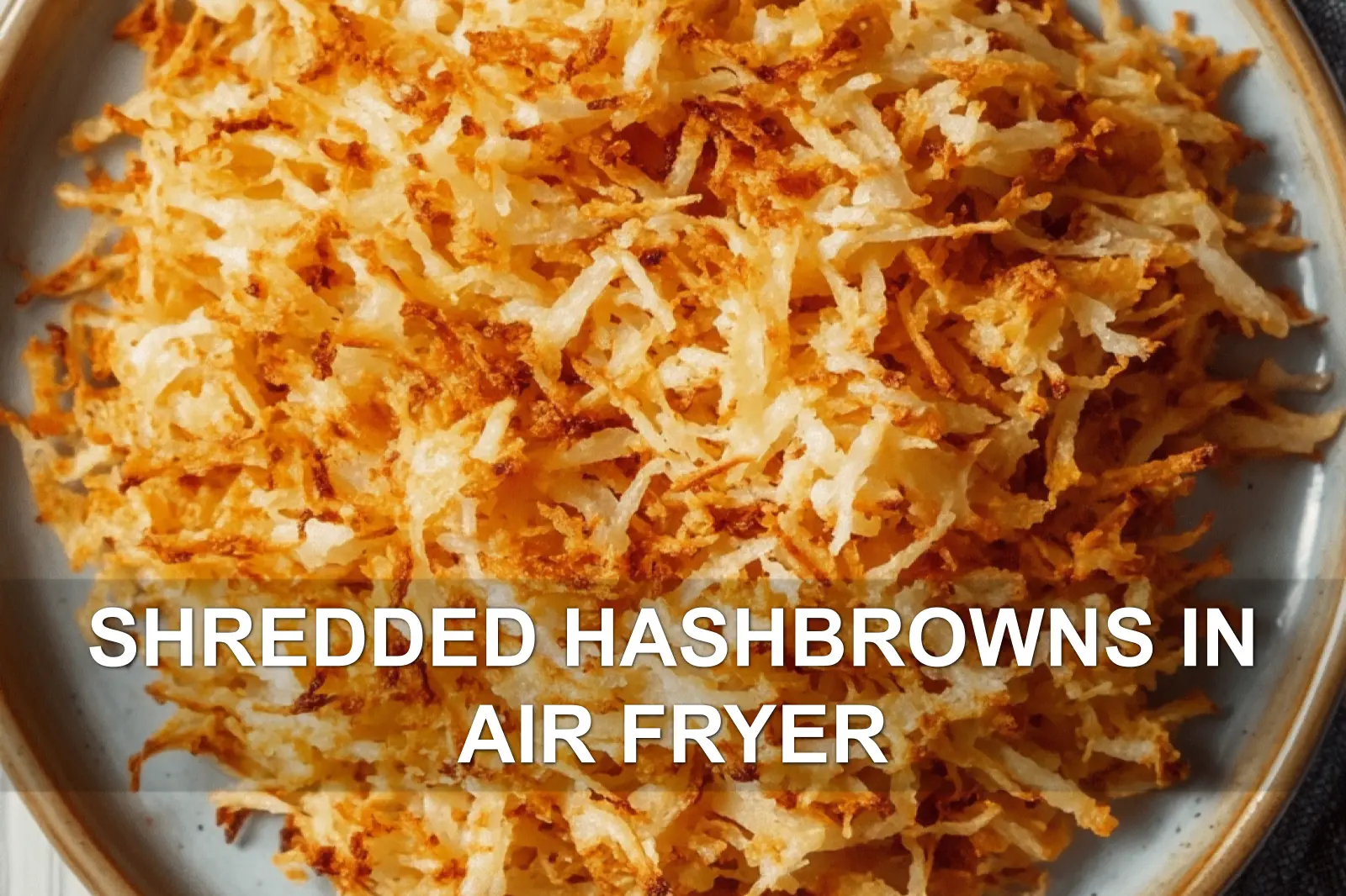 SHREDDED HASHBROWNS IN AIR FRYER centered hero view, clean and uncluttered