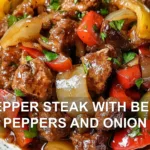 PEPPER STEAK WITH BELL PEPPERS AND ONION centered hero view, clean and uncluttered