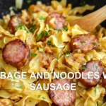 CABBAGE AND NOODLES WITH SAUSAGE centered hero view, clean and uncluttered
