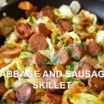 CABBAGE AND SAUSAGE SKILLET centered hero view, clean and uncluttered