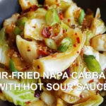 STIR-FRIED NAPA CABBAGE WITH HOT SOUR SAUCE centered hero view, clean and uncluttered